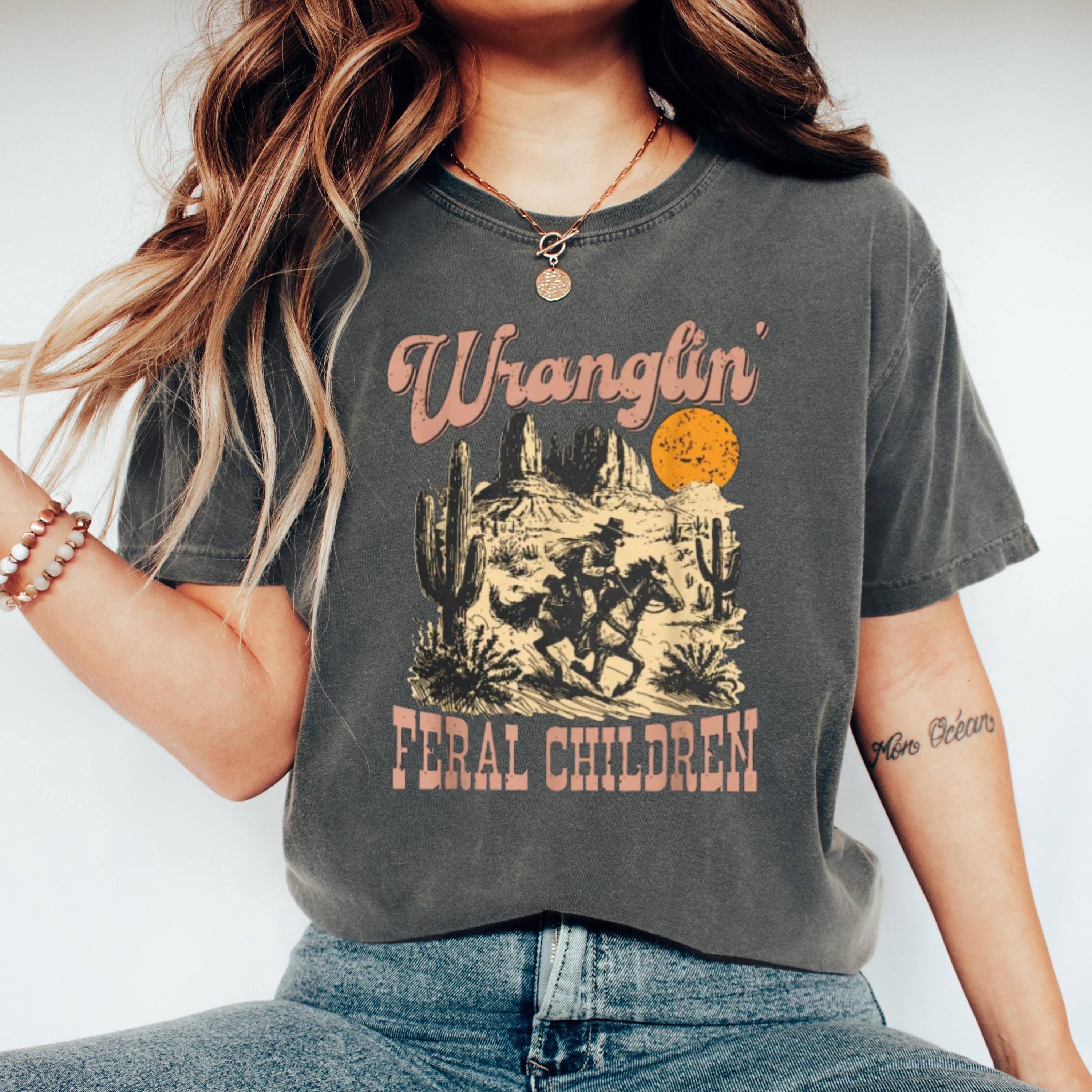 Funny Western Cowboy Shirt: Wranglin' Feral Children Graphic Tee